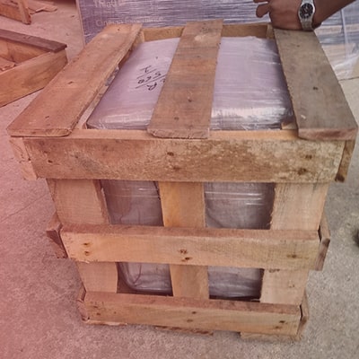 the goods wrapping with polythene inside in the wooden box