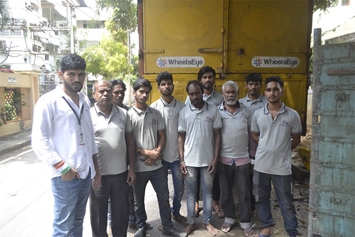 On Road Packers And Movers in bangalore team posing for a group photo